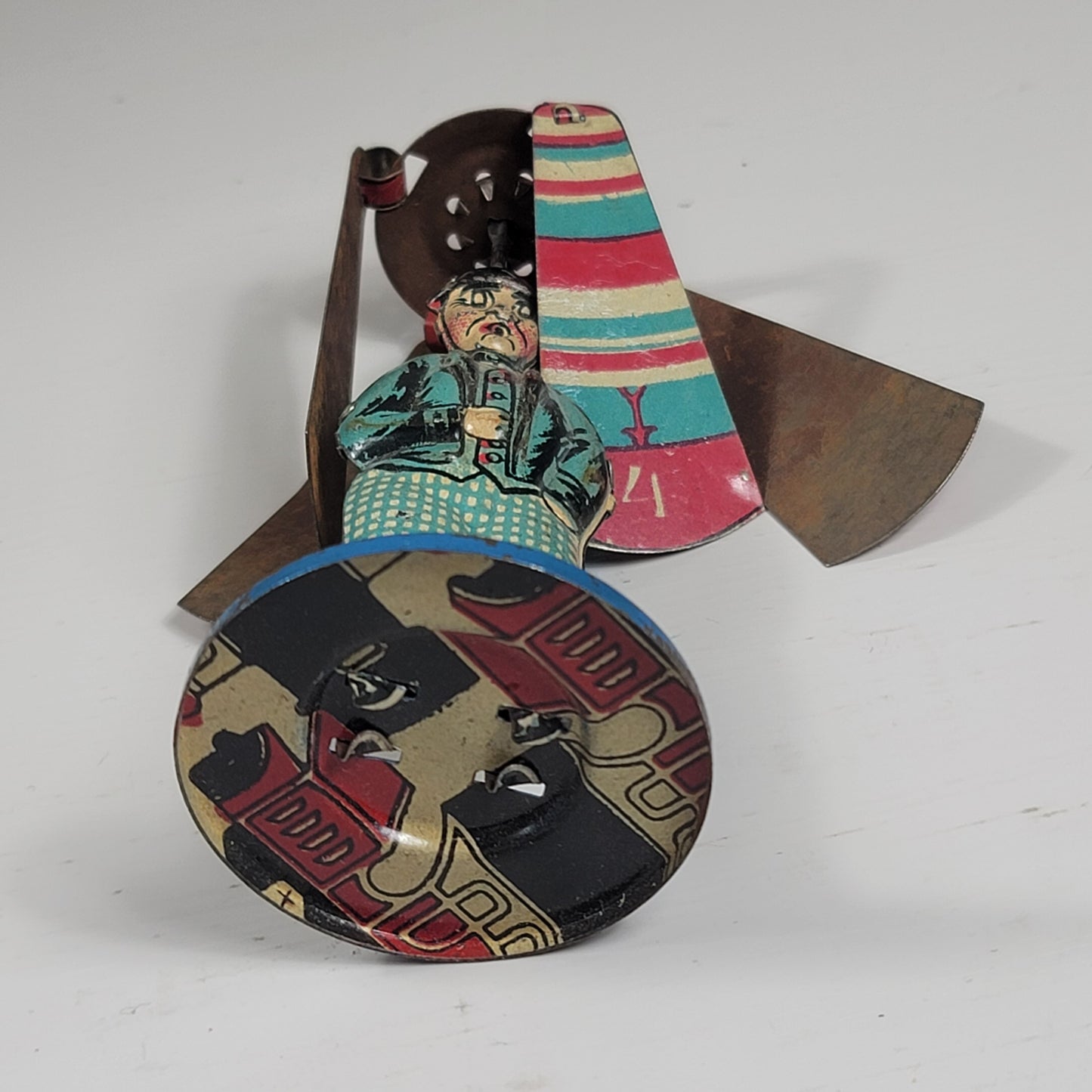 Rico Tin Litho Man w/ Rotating Umbrella Propeller