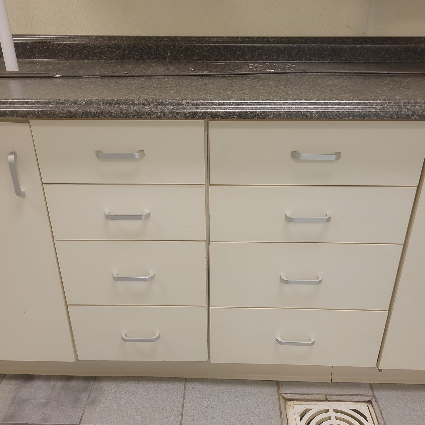 Upper and lower cabinets with countertop