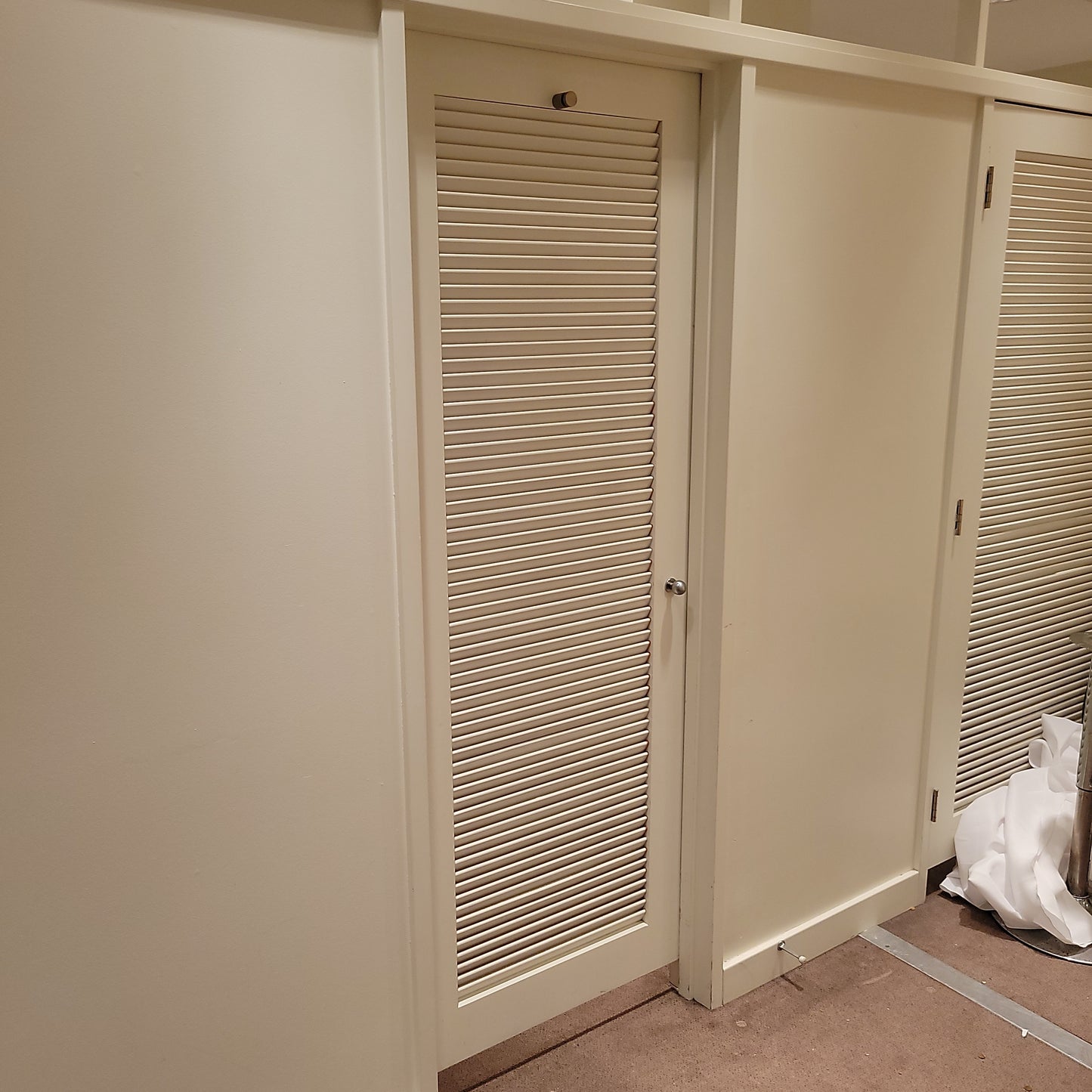 Louvered dressing room door