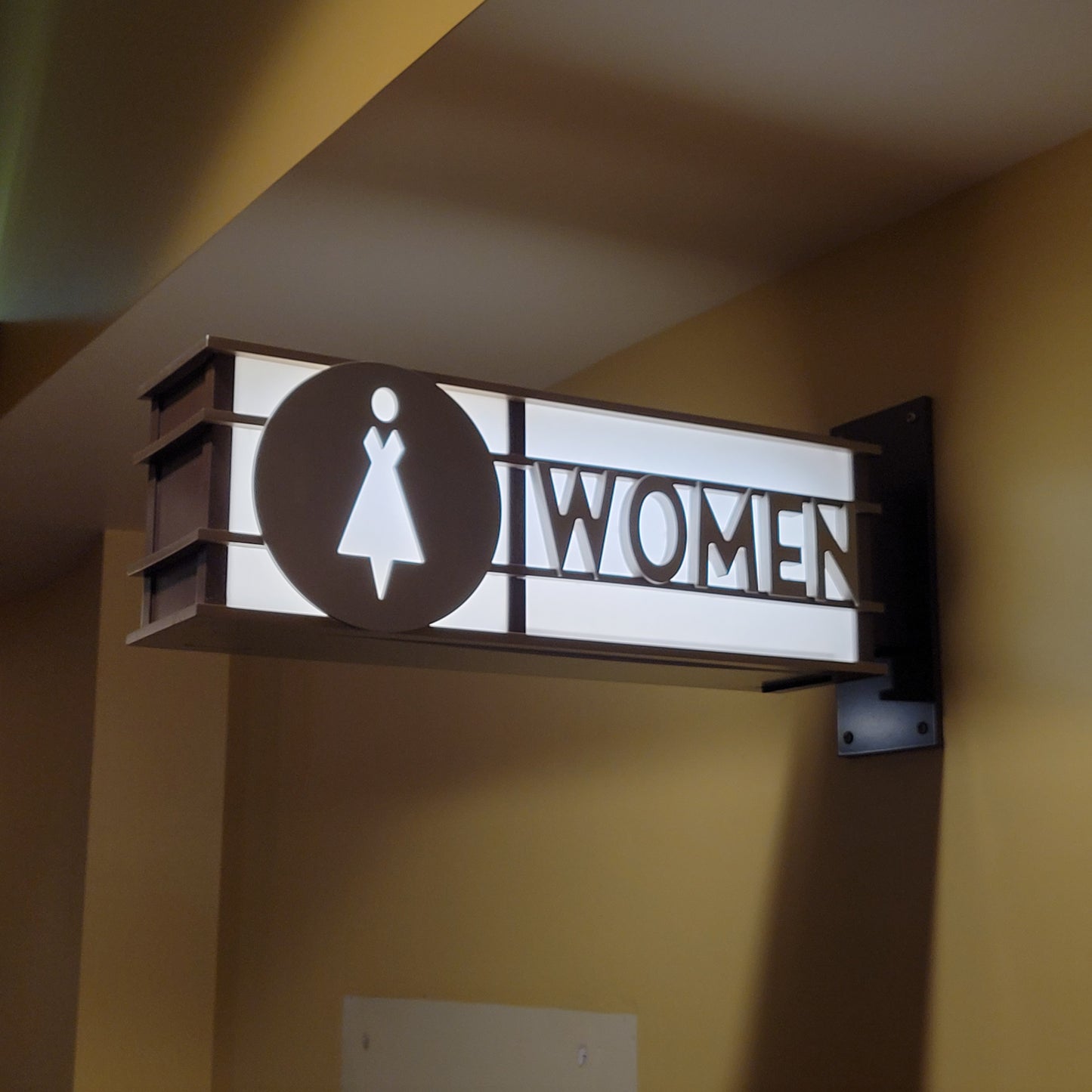 Illuminated AMC "Women" Sign