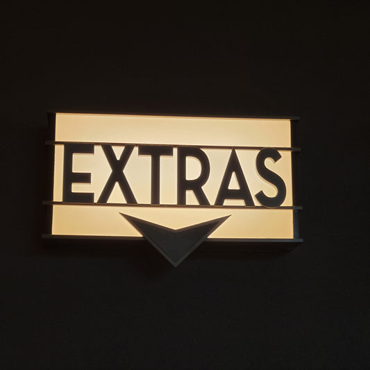 Illuminated AMC "EXTRAS" Sign