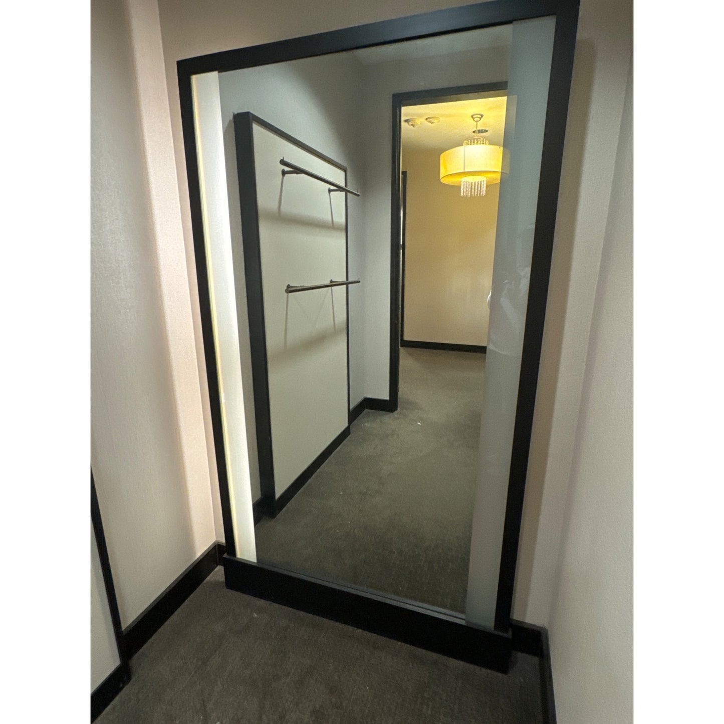 Large mirror with fluorescent lights