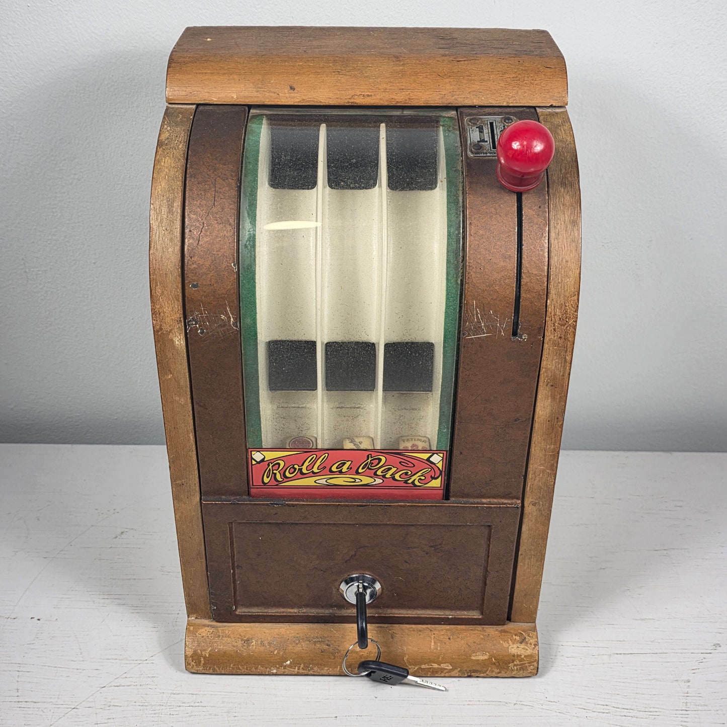 1941 Victor “Roll a Pack” 1¢ Wooden Cigarette Trade Stimulator